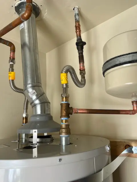 Water heater installation and plumbing repair in Old Englewood Village